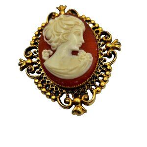 Vintage Cameo Locket Brooch 1970s AVON two inches can hold keepsake or perfume